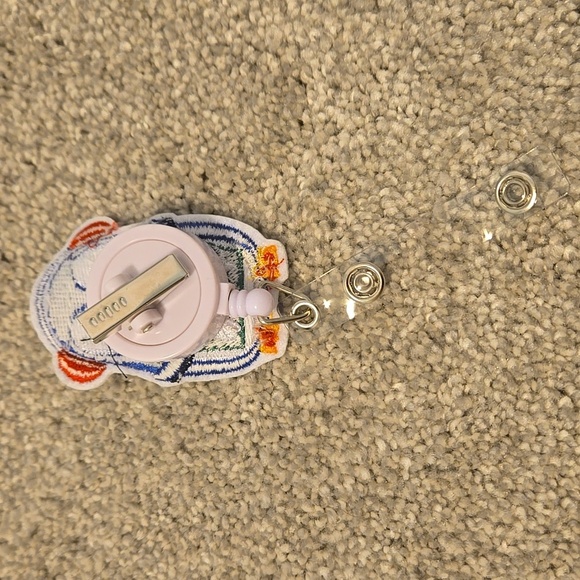 Penguin Badge Reel with Gift Design - Picture 2 of 2